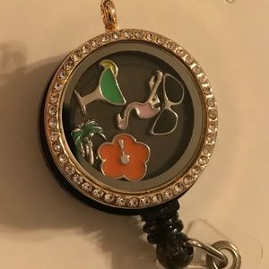 3/$75 Tropical2 locket badge reel